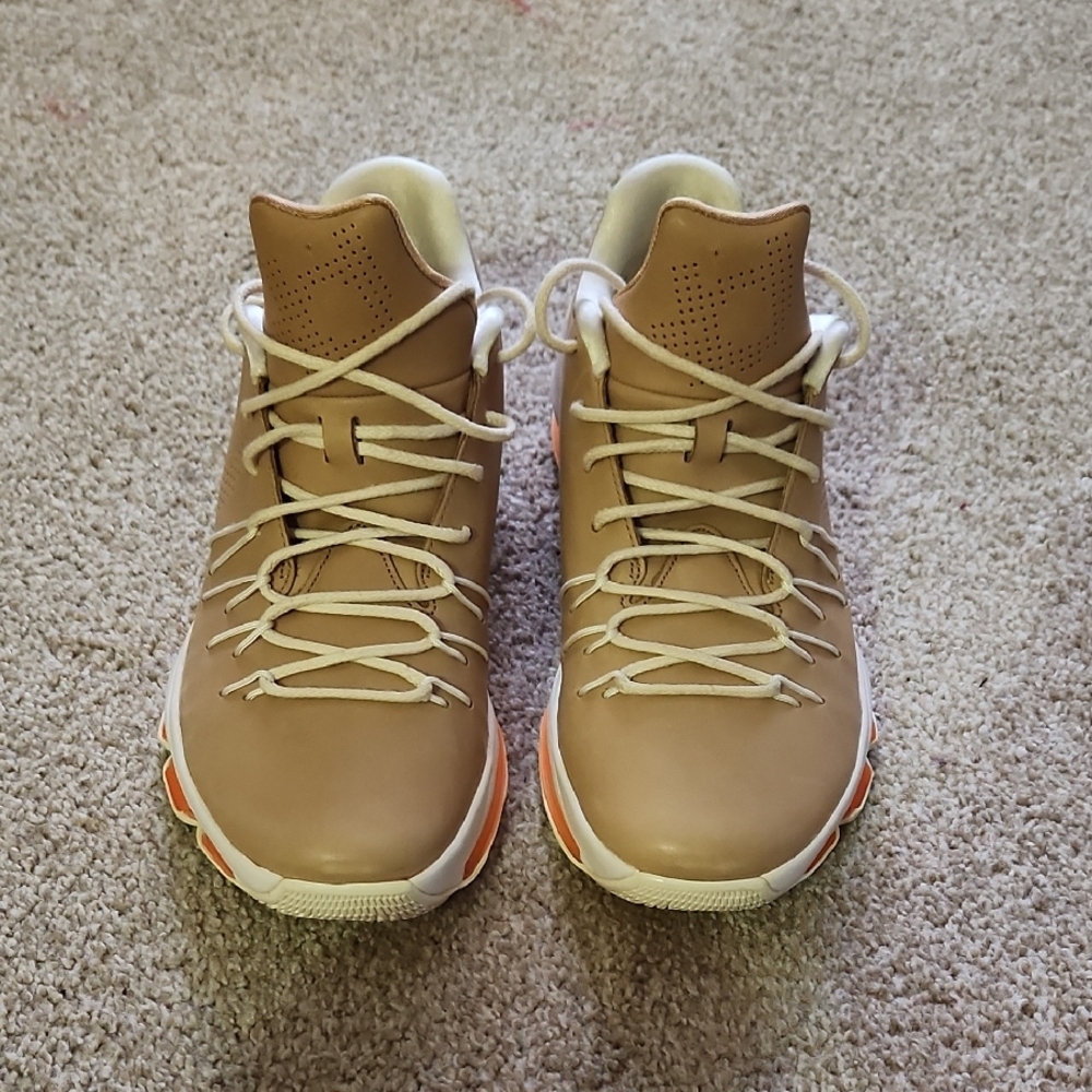 Tan High-Top Sneakers with White and Orange Accents